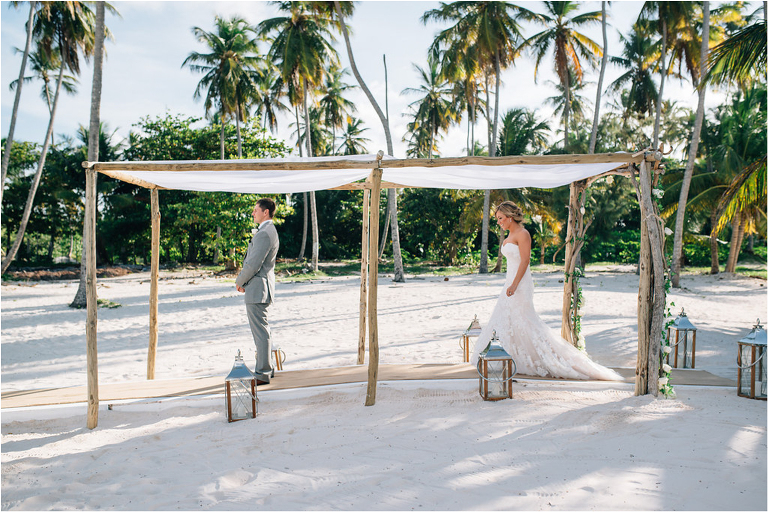first look on the beach under walkway arch