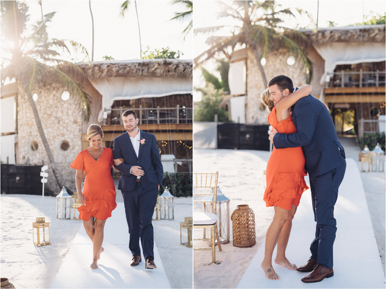 groom walks down the aisle with mom