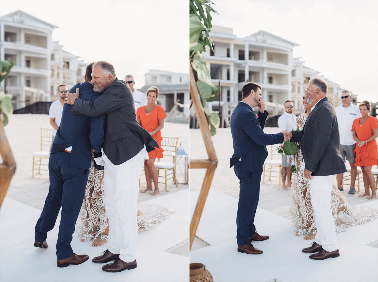 groom hugging brides dad